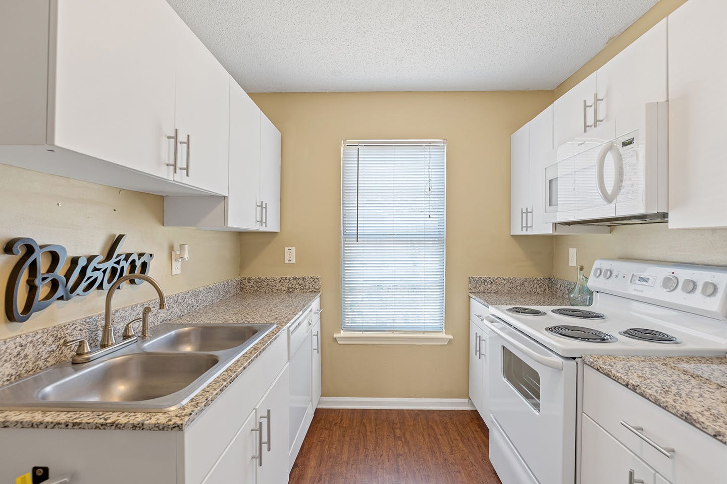 Fully-equipped kitchen with modern appliances.